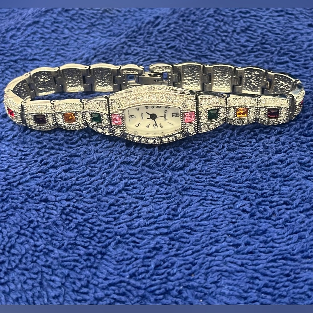 Women’s Bejeweled Stainless Steel Dress‎ Watch.